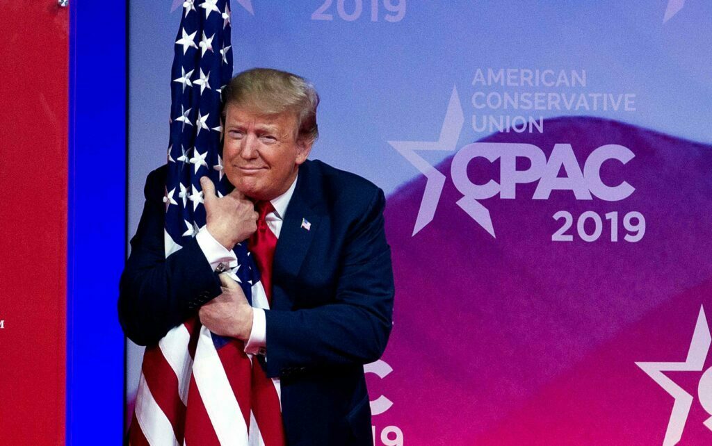 Donald Trump Hugging Flag At CPAC