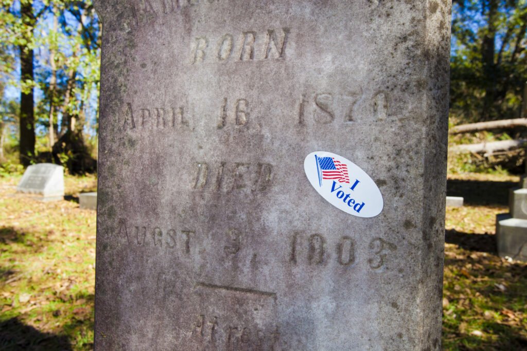 Grave With I Voted Sticker