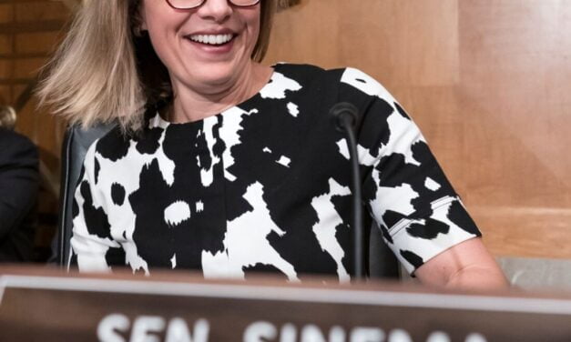Sinema drops the Democrat label